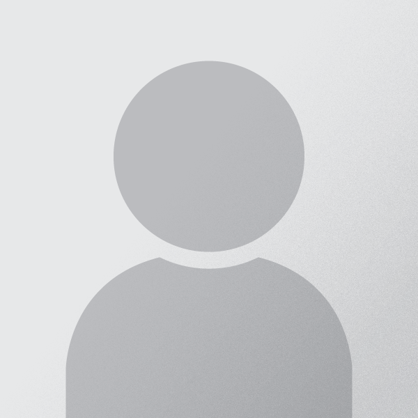 A gray, generic user icon with a circular head and shoulders on a light gray background, representing a placeholder profile image.